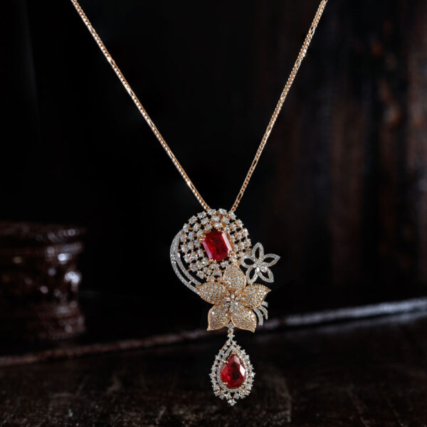 Floral Ruby, Diamonds and Rose Gold Pendant Suspended from a chain