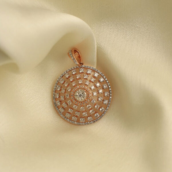 Rose Gold and Diamonds Spiral Pendant on a white silk background