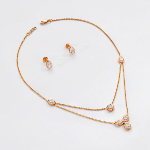 Minimalist Rose Gold and Diamond Necklace on white background