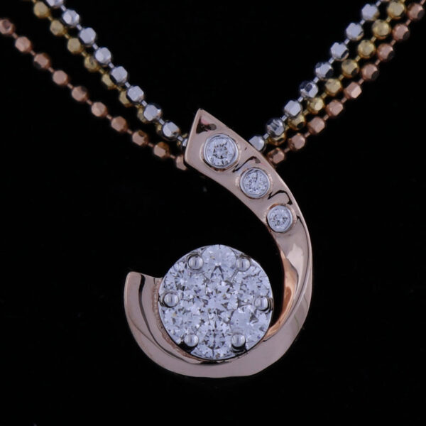 Hook Shaped Diamond on Rose Gold Pendant on a black background