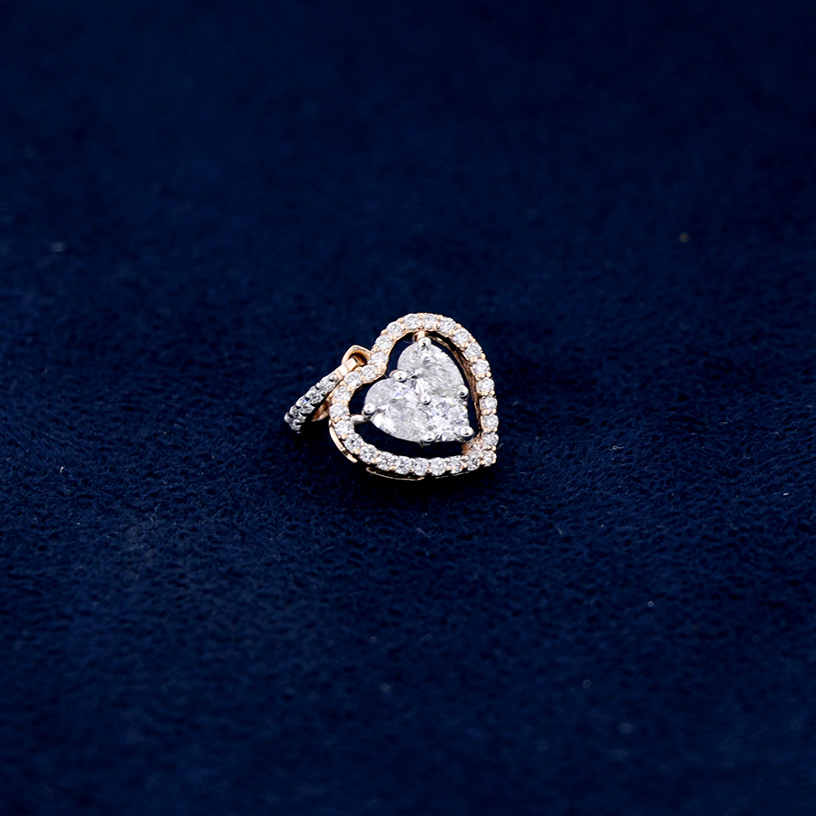 Heart Shaped Real Diamond Pendant on a dark blue background